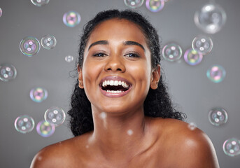 Wall Mural - Beauty, makeup and skincare woman with bubble for facial cleaning, hygiene and self care wellness. Health lifestyle, cosmetics product or aesthetic face portrait of happy model girl with soap bubbles