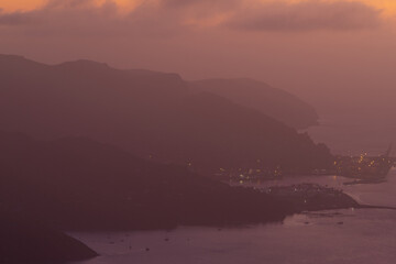 Wall Mural - Foggy layer of mountains at sunrise time.