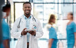 Black man, doctor and healthcare, hospital and tablet for communication with technology and digital medical information. Health insurance, professional and smile in portrait, stethoscope at clinic.