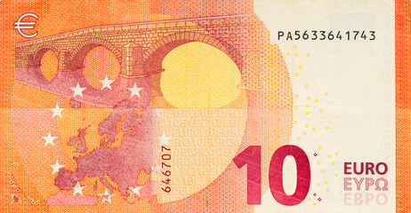 One ten Euro bill. 10 euro banknote close-up. The euro is the official currency of 19 out of the 27 member states of the European Union