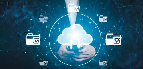 Wall Mural - businessman hold smartphone with data information on the cloud computing technology internet storage