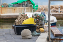 Fishing Equipment In Crates By The Sea