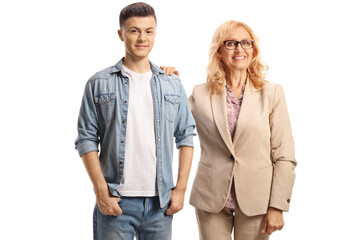 Wall Mural - Cheerful mother and son posing and smiling at camera