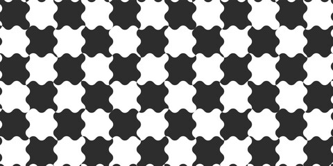 Wall Mural - Wavy chess cells. Vector puzzle of simple shapeless shapes. Checkered and black and white seamless print for various surfaces.