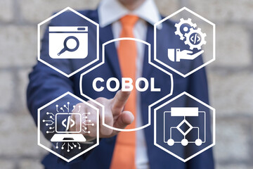 Wall Mural - businessman using virtual touchscreen clicks word: cobol. concept of cobol business programming lang