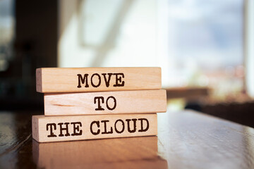 Wall Mural - Wooden blocks with words 'Move to the Cloud'.