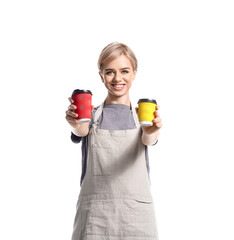 Sticker - Female barista with cups of coffee on white background