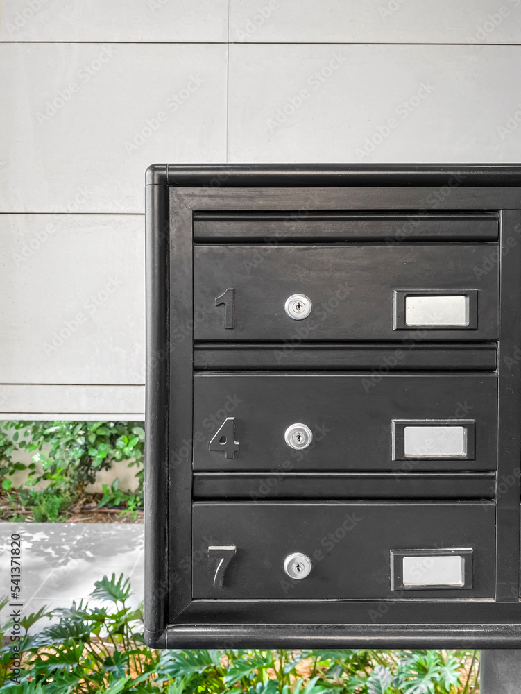 Modern mailboxes in residential building, closeup