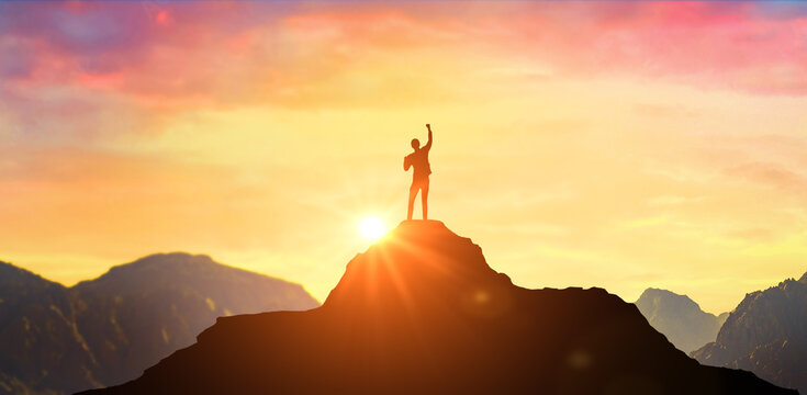 Wall Mural -  - Success Business Leadership, Winner on top. Silhouette of businessman on top mountain, sky and sun light background. Business success and goal concept.