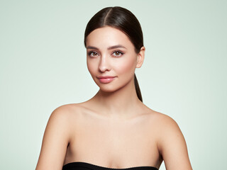 Wall Mural - beautiful young woman with clean fresh skin look away. girl beauty face care. facial treatment. cosm