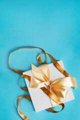 Poster - Gift box on blue background