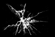 Pieces Of Destructed Shattered Glass. Royalty High-quality Free Stock Photo Image Of Broken Glass With Sharp Pieces. Break Glass White And Black Overlay Grunge Texture Abstract On Black Background