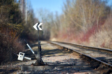 Hand-operated Railroad Switch With Lever Signal Weight. Old Railroad Switch Near Spring Sunny Forest. Selective Focus Shot.