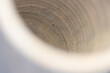 Inside the rustic pot head of traditional Japanese pottery, inspired from Tanegashima ware. Texture macro photograph.