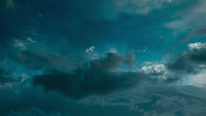 Wall Mural - 4k Cumulus Cloudy Sky With Heavy Clouds. Dark Clouds Illuminate By Sun Sky Natural Background. Sunset Time Lapse Time-Lapse In Yellow, Orange, Pink Colors. Darkness Turns Into Light. Cloud White Blue