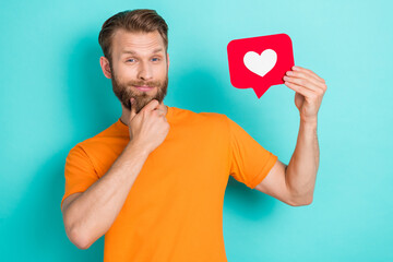 Sticker - Photo of thinking brown hairdo guy hold like wear orange t-shirt isolated on turquoise color backgroiund