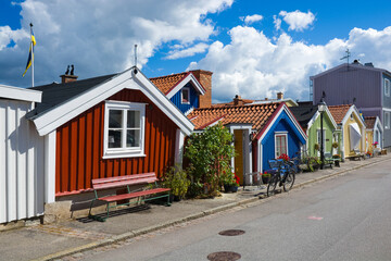 Sticker - Colorful wooden houses in Bjorkholmen, the oldest district of Karlskrona, Sweden