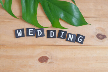 Wall Mural - Wedding text on wood table , love concept.