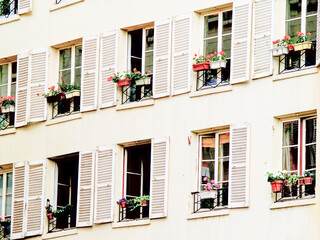 Poster - Rows of shuttered windows in multi-level inner-city apartments