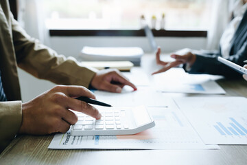 Asian entrepreneurs and business people meeting in a conference room in business planning, financial budget and investment risk assessment to analyze customer groups to increase company growth