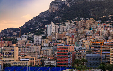 Wall Mural - Monte Carlo cityscape and luxury yachts in harbor of Monaco, Cote at sunset