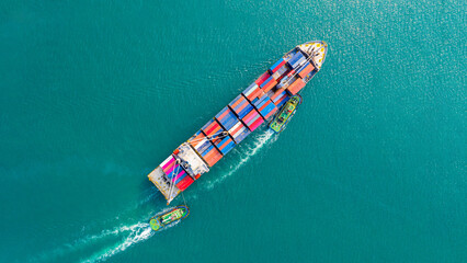 Aerial view of sea freight, Cargo ship, Cargo container in factory harbor at industrial estate for import export around in the world, Trade Port / Shipping - cargo to harbor