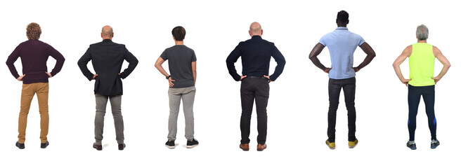 Wall Mural - back view of a group of men with arms akimbo on white background