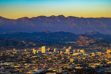 Fototapete - Sunset above downtown Glendale and San Gabriel Mountains in California