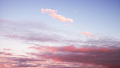 Wall Mural - sunset sky background with pink and purple clouds, blue background