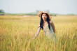 © yu - girl walking on rice fields
