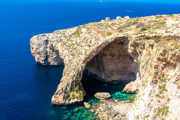 Wall Mural - The Blue Grotto of Malta,  rock formation on the sea with crystal clear water