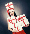© yurolaitsalbert - happy young woman in costume of Santa Claus with lots of Christmas shopping.