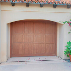 Wall Mural - Square Garage exterior with wooden door and arched entrance at La Jolla, California