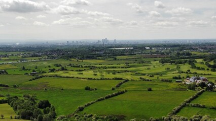 Wall Mural - Aerial view of green fields and open countryside. Taken in Lancashire England. 