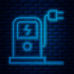 Sticker - Glowing neon line Electric car charging station icon isolated on brick wall background. Eco electric fuel pump sign. Vector