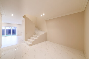 Wall Mural - new interior design of a bright house with a large corridor and stairs