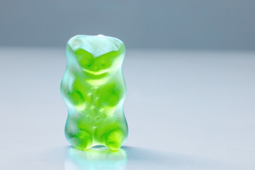 A Green gummy bear candy fruity flavours