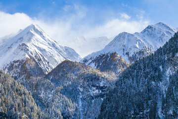 Wall Mural - Snow capped mountain peaks in the wilderness