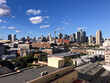 © Austockphoto - top shot of a city with buildings and skycrapers on a sunny day