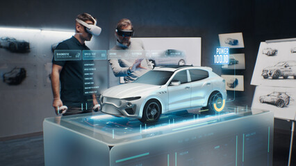 Two development engineers in the studio are designing an eco-friendly sustainable standard electric vehicle using 3D modeling technology and VR headsset. 3D interface of diagnostic application.