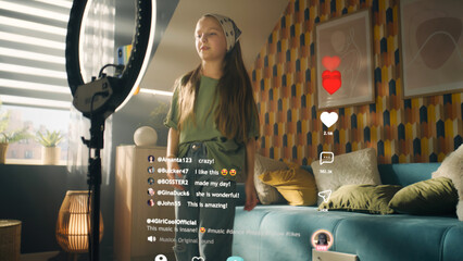 girl dancing and singing on online stream, watching video, changing filters, making content in mobil