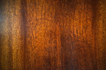 Wall Mural - Wooden background of mahogany lacquered. The texture of luxury wood in the furniture interior.