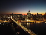 Fototapeta  - Bay Bridge in San Francisco at Night Aerial