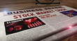 Stock market crash and business crisis newspaper on table
