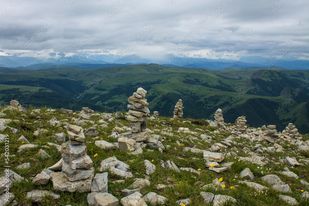 Pyramids Blured Picture Traditional stone pyramids built by tourists on the Bermamyt plateau in ...