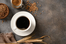 Organic Barley Coffee In White Cup On Brown Background. Best Natural Caffeine Free Organic Coffee Alternative. Coffee Substitute Beverage Made Of A Healthy Blend Of Roasted Barley. View From Above