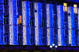 Fototapeta  - Decorative illumination of garlands in the night city, selective focus. Background