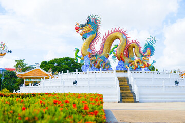 Wall Mural - Golden dancing dragon at Suan Sawan, Sawan Park or Paradise Park in Nakhon Sawan Province, Thailand.