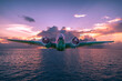 A Lockheed Hudson Bomber goes for a sunset flight over an ocean. Digital art - this plane is actually on display at the North Atlantic Aviation Museum in Gander, Newfoundland.