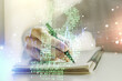 © Pixels Hunter - Creative Bitcoin concept with man hand writing in notebook on background. Multiexposure